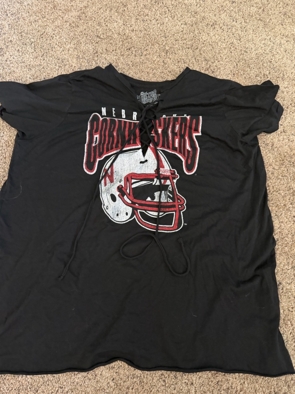 Abrand Black Lace-Up Nebraska Husker Tee with Red Accent